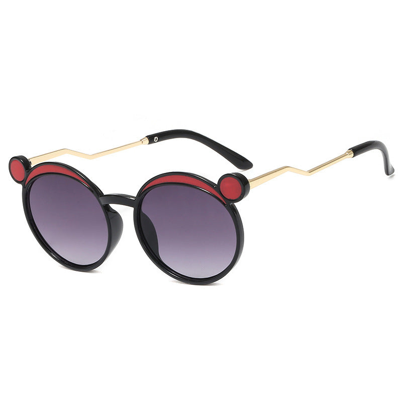 Damen Fashion-Runde Sonnenbrille mit innovativem Rahmen und farbigen Gläsern Brehn