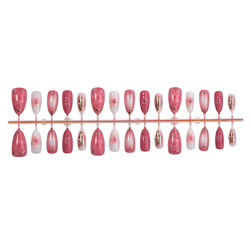 Kunstnagelset mit eleganten Blüten- und Glitzerdetails Brehn