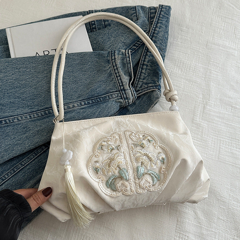 Elegante gestickte Abendhandtasche
