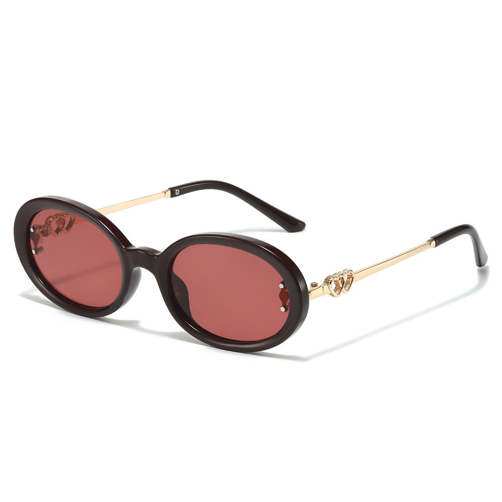 Elegante Shield Sonnenbrille mit dekorativen Metalldetails Brehn