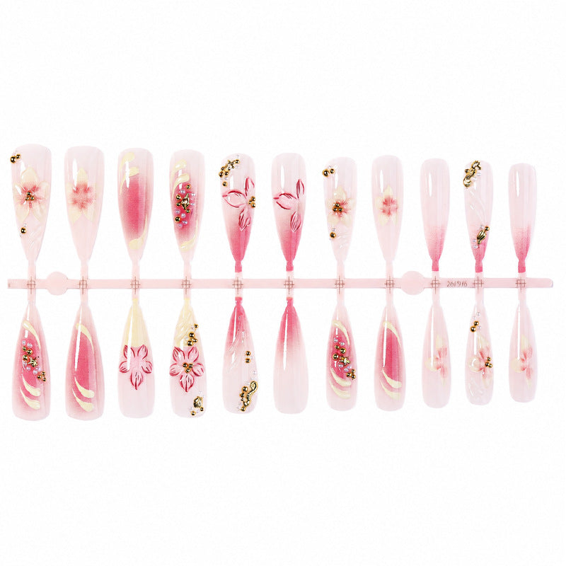 Dekorativer Stiletto Press-On Nagelkunst Set mit floralem Akzent Brehn