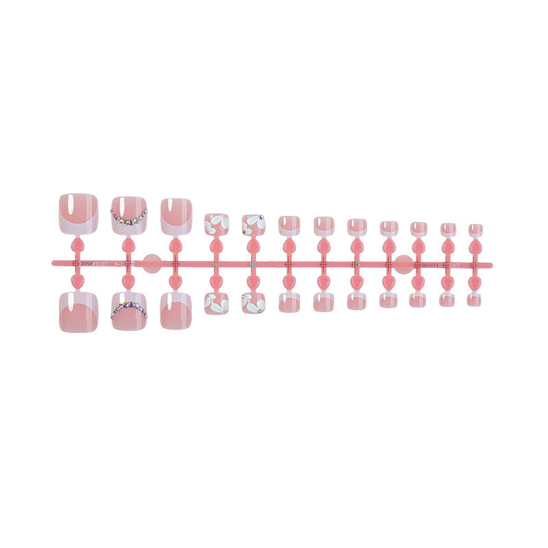 Kreatives Kunstnagelset mit eleganten Blumen-Designs und Glitzerakzenten Brehn