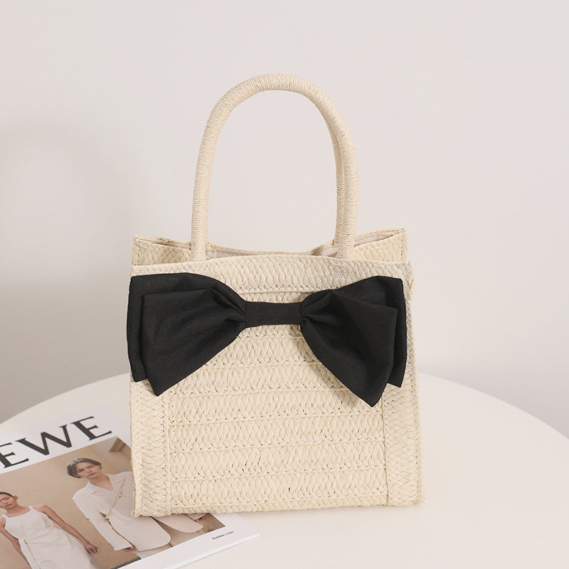 Elegante Basttasche mit Schleifendetail Brehn