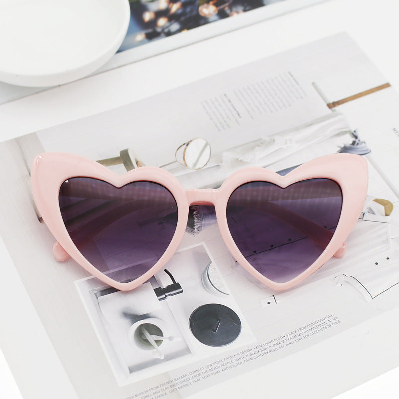 Damen Herzförmige Sonnenbrille mit glitzerndem Rahmen Brehn