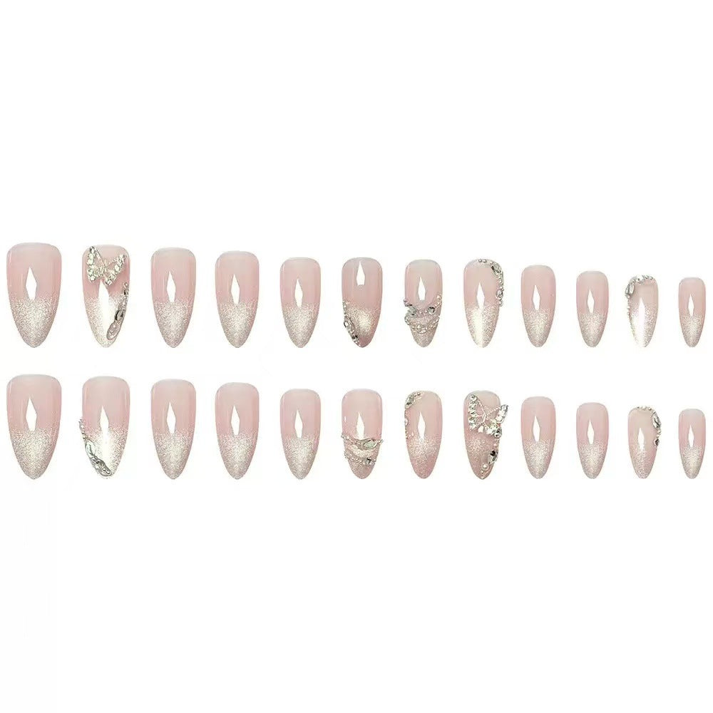 Künstlerische Stiletto-Nagelerweiterungen mit Strass-Akzenten Brehn