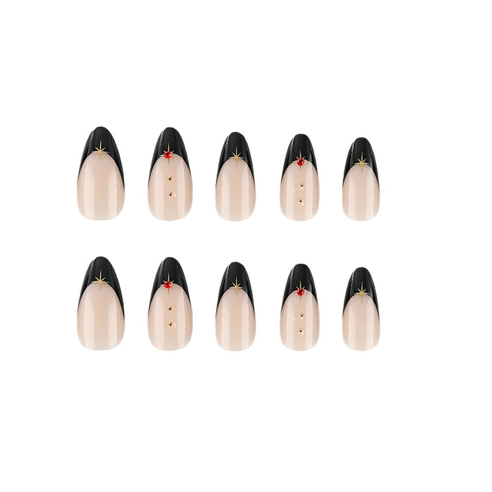 Glamouröse Kunstnägel Im Stilvollen Stiletto-Design mit Goldenen Akzenten Brehn