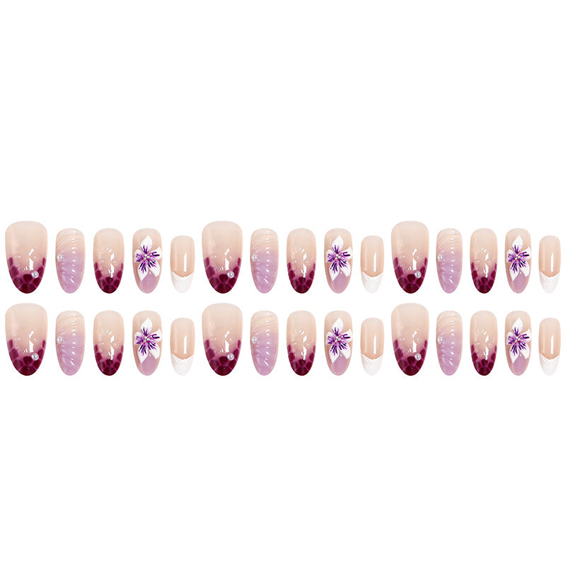 Kunstnagelset mit elegantem Ombre-Design und floralen Akzenten Brehn