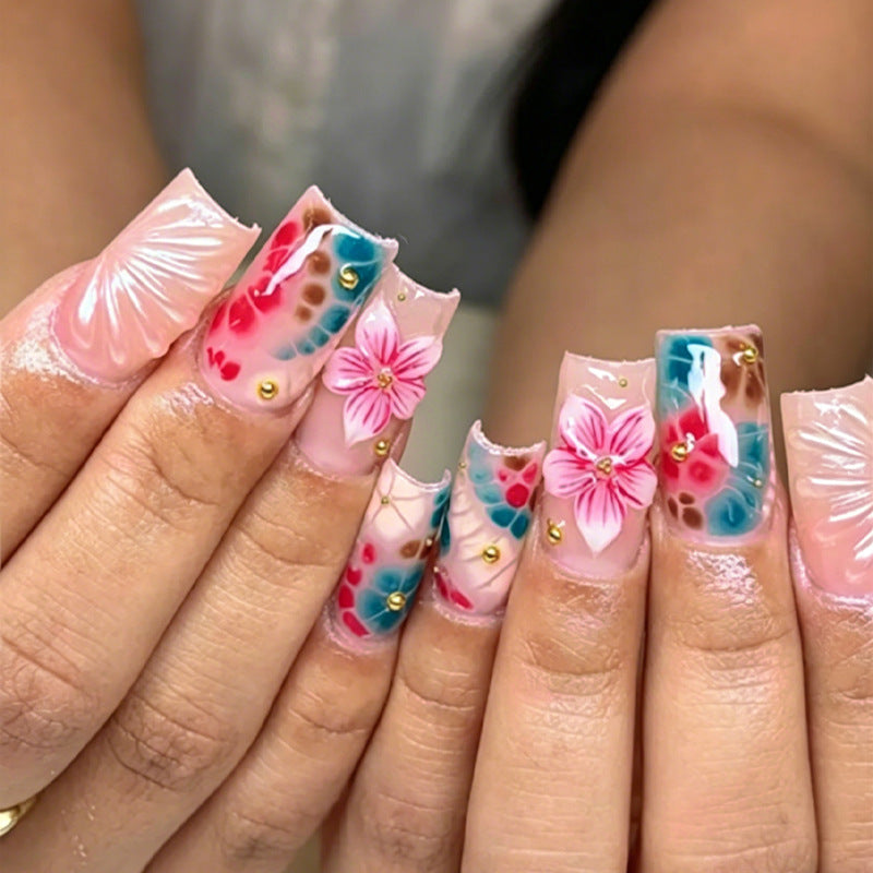 Kunstnagelset mit elegantem, floralem Design Brehn