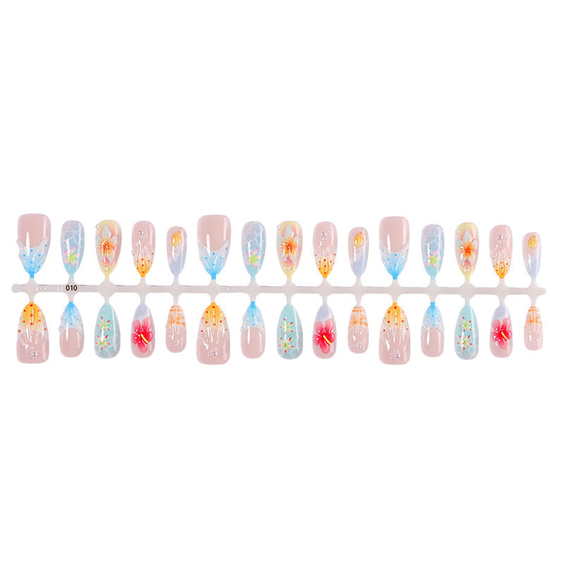 Kunstnagelset mit farbenfrohen Blumen- und maritimen Designs Brehn