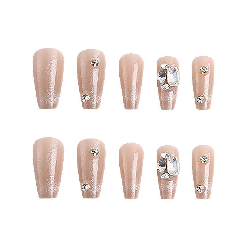 Kunstnagelset mit glamourösen Glitzerakzenten und eleganten Schmuckverzierungen Brehn