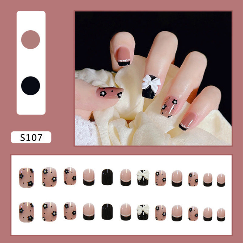 Kunstnagelset mit eleganter Schleifen- und Blumendekoration Brehn