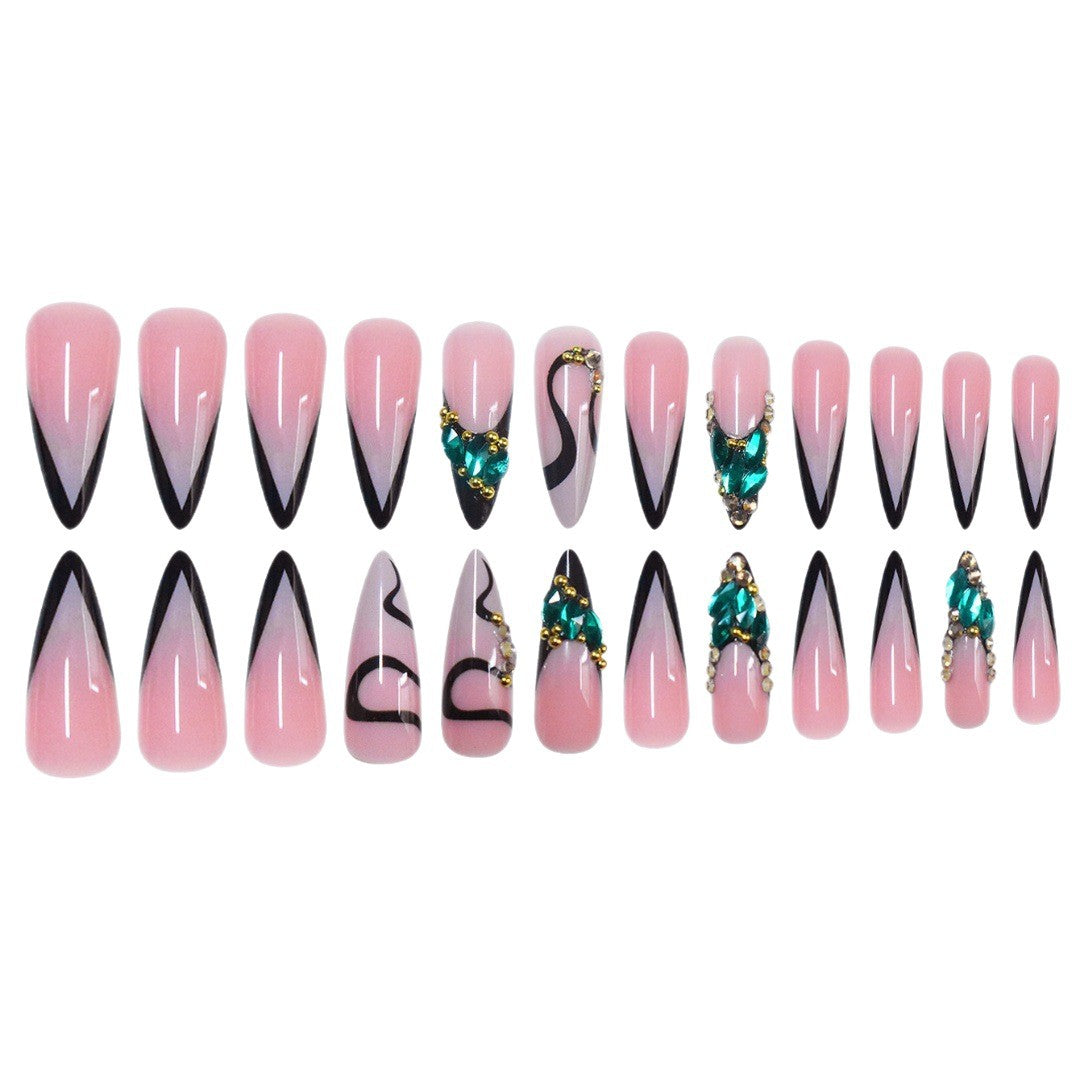 Künstlerische Stiletto Press-On Nagelkunst mit Edelsteinakzenten Brehn