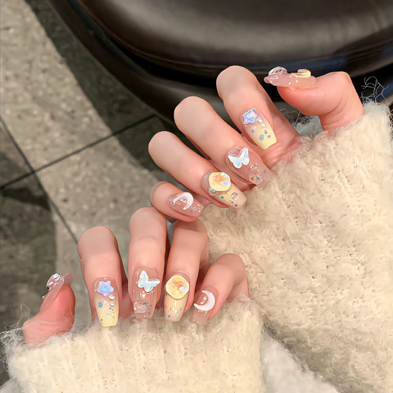 Dekorative Press-On Nagel Set mit Stern- und Mondakzenten Brehn