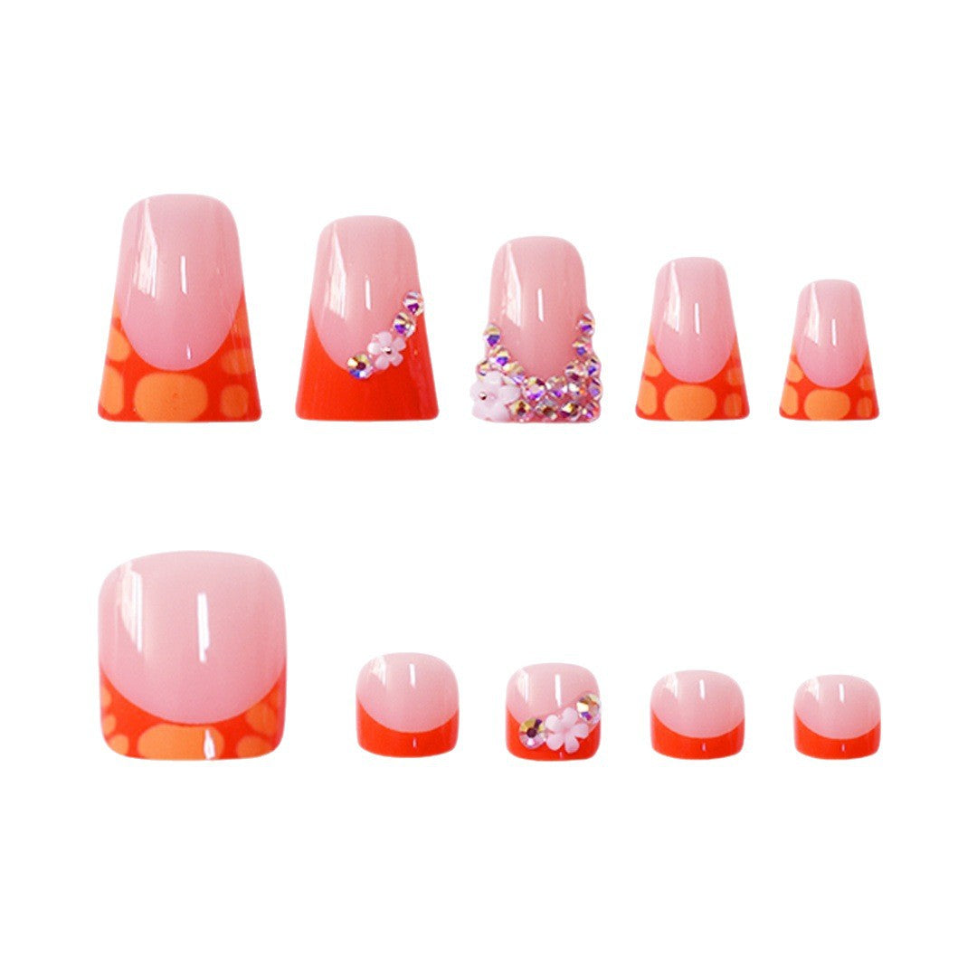 Dekoratives Press-On-Nagelset mit lebhaften Formen und Edelsteinen Brehn