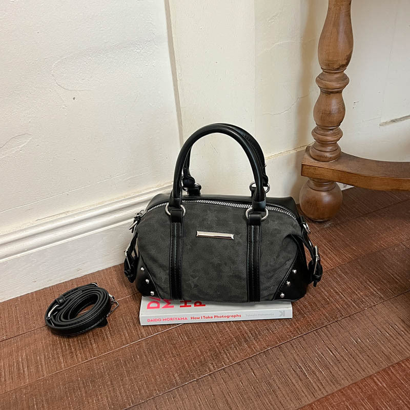 Zeitgenössische gemusterte Handtasche
