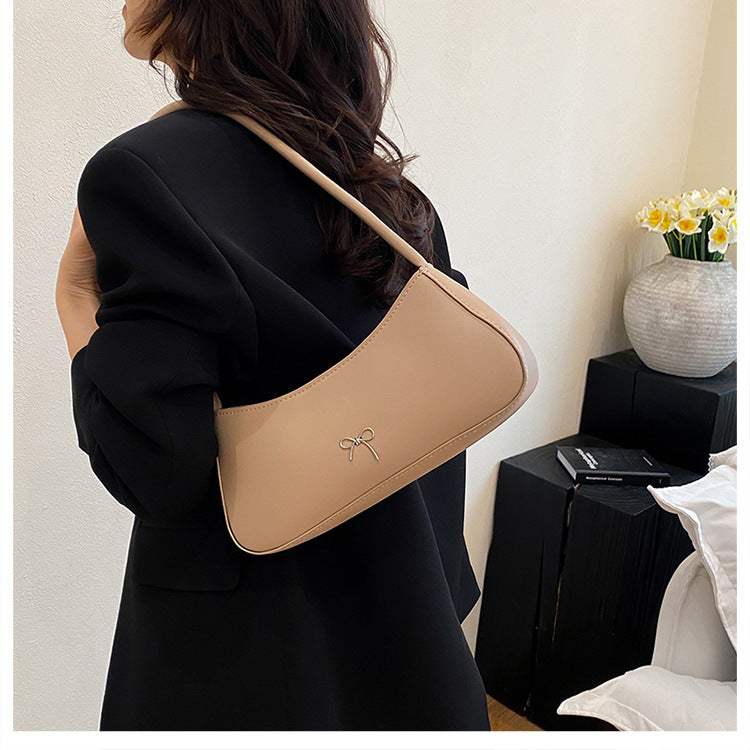 Elegante geschwungene Handtasche Brehn