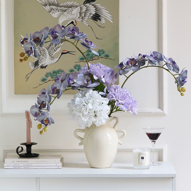 Lebensechte künstliche Orchideenarrangement