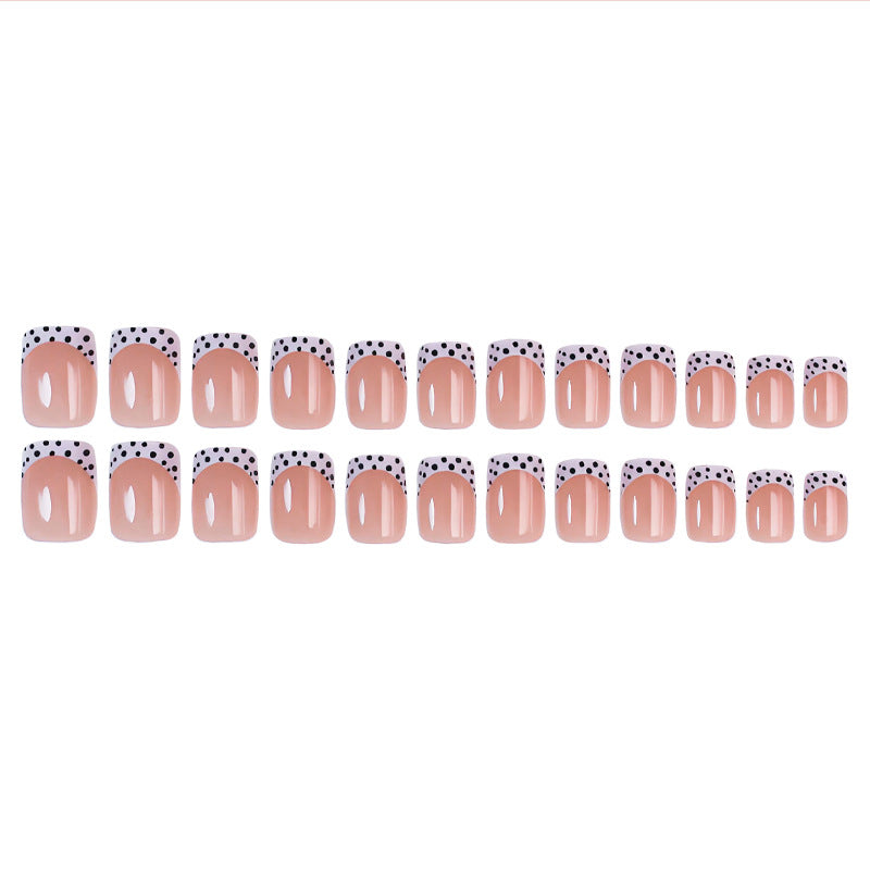 Kunstnagelset mit eleganten Punkten und hochglänzenden Akzenten Brehn