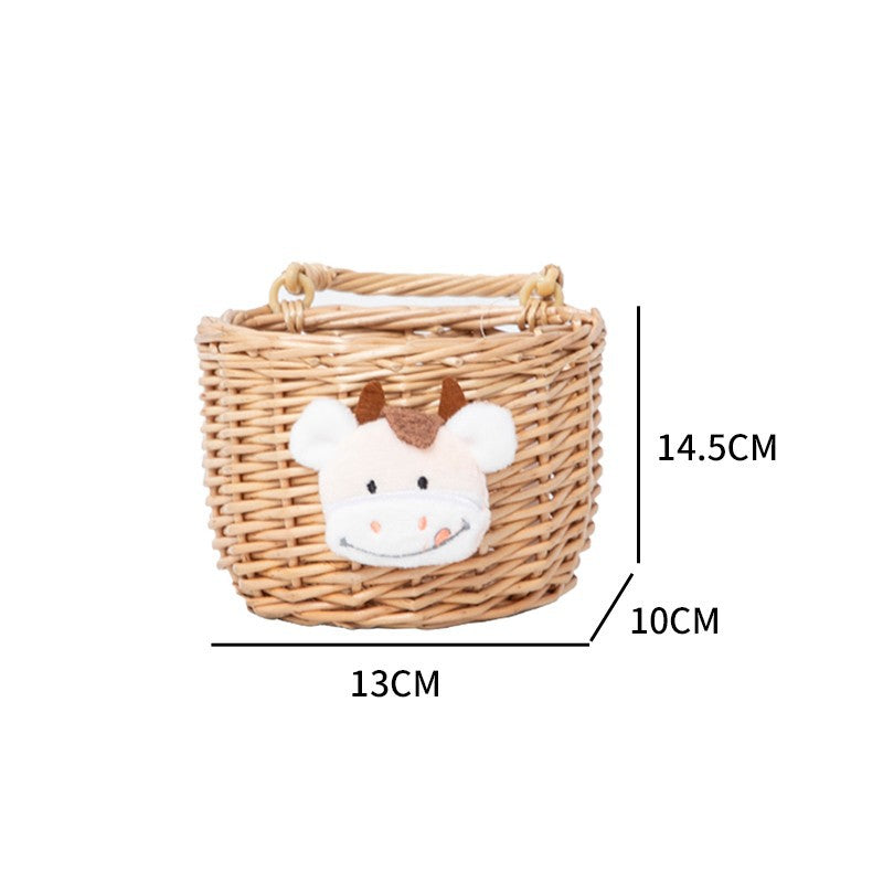Korbt aus gewebtem Material mit niedlichem Tiermotiv