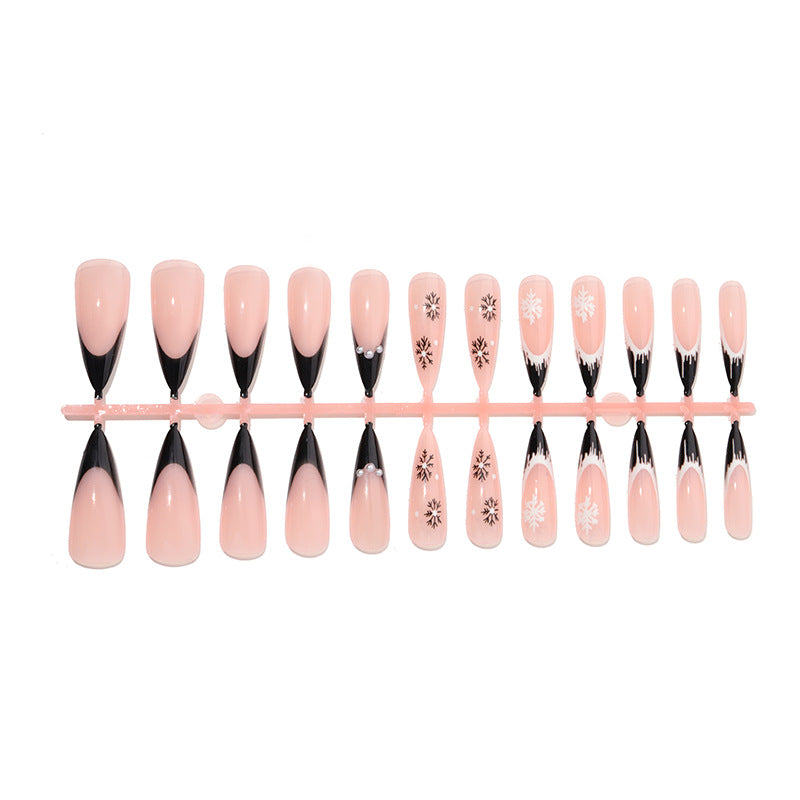 Künstlerisches Stiletto Press-On Nagelset mit dekorativen Schneeflocken-Designs Brehn