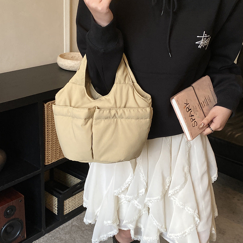 Gepolsterte Utility-Handtasche