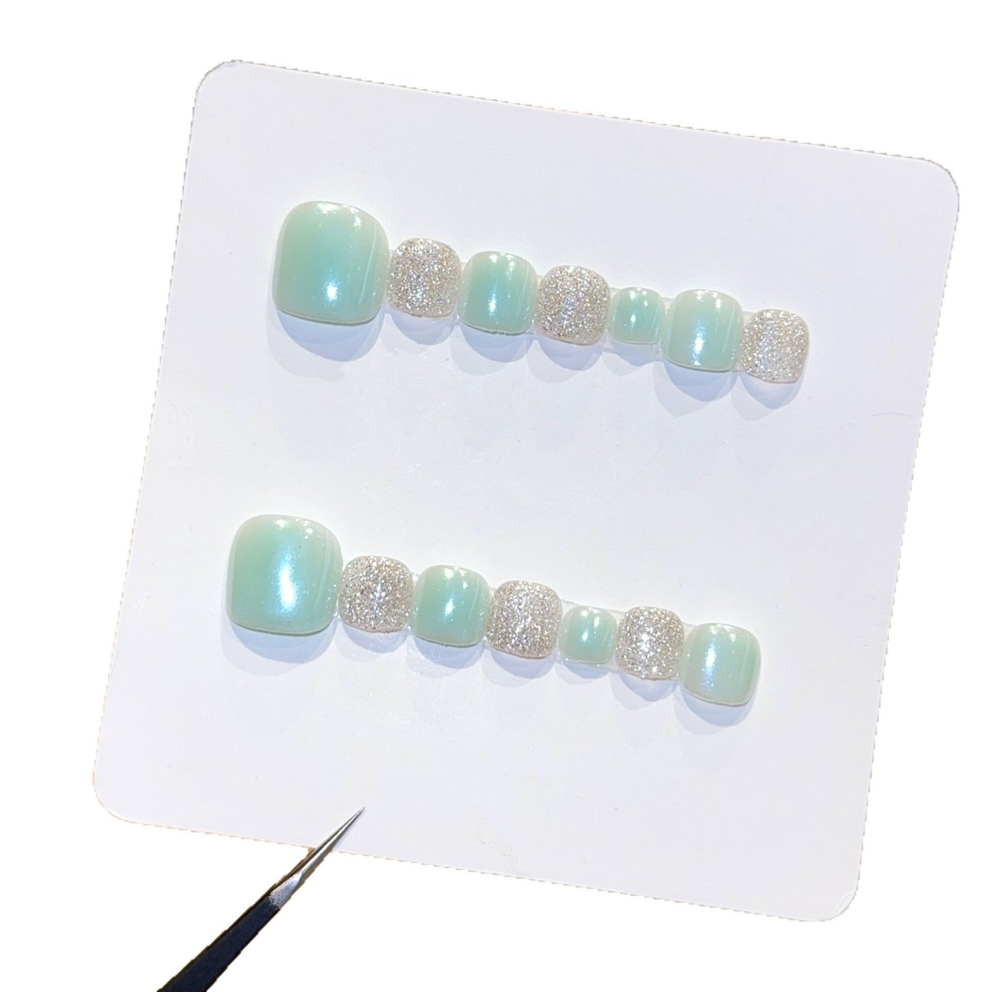 Kunstnagelset mit Glitzer- und Pastellakzent Brehn
