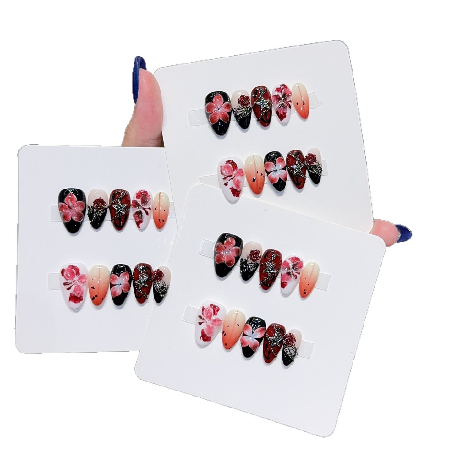 Kunstnagelset mit Floralen Motiven und Glitzerakzenten Brehn