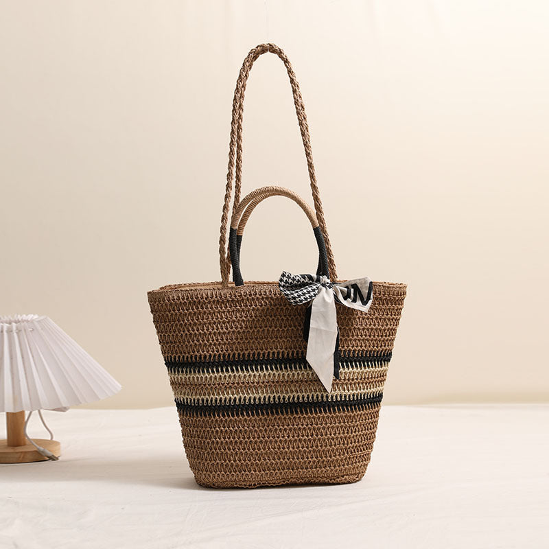 Damen Handtasche aus geflochtenem Naturmaterial mit modischem Akzent Brehn