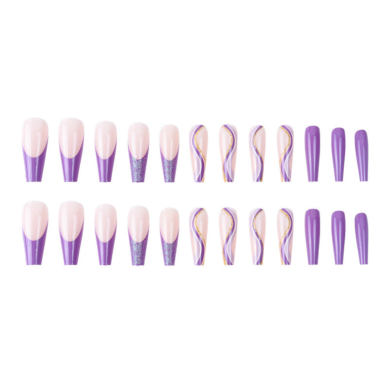 Glamouröse French Tip Stiletto Press-On Nägel dekoriert mit Glitter und goldenen Akzenten Brehn