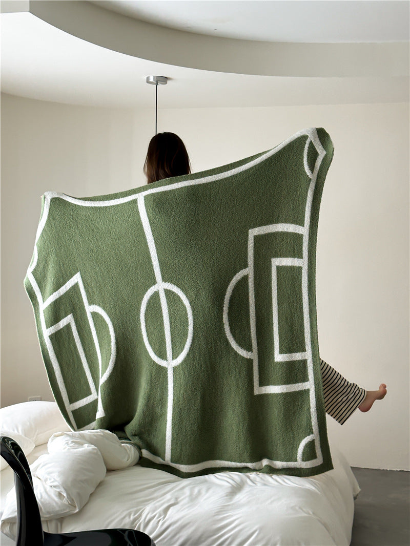 Kuscheldecke mit großem Schriftmotiv und weichem Bouclégewebe