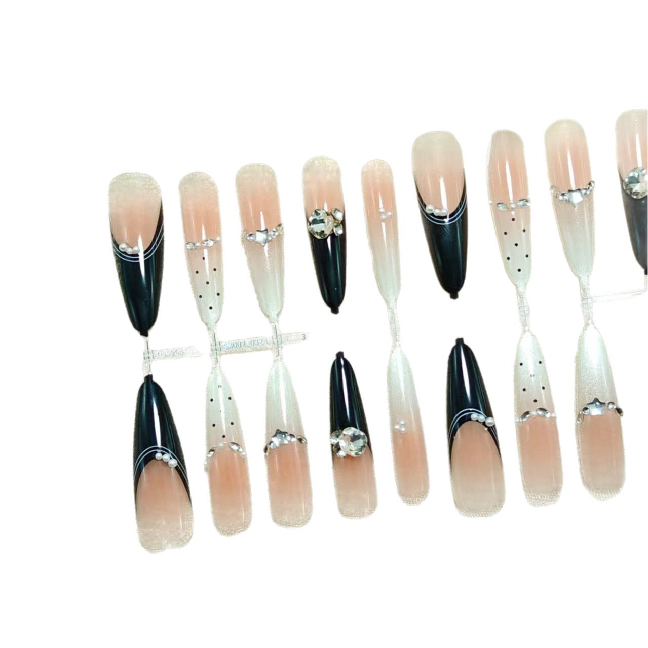 Elegante Kunstnägel mit Glitzer-Akzenten und Modischem Design Brehn