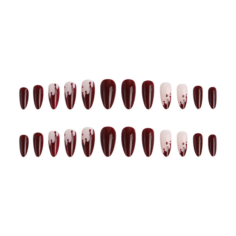 Kunstvolle Nagelspitzen mit Tropfen-Design Brehn
