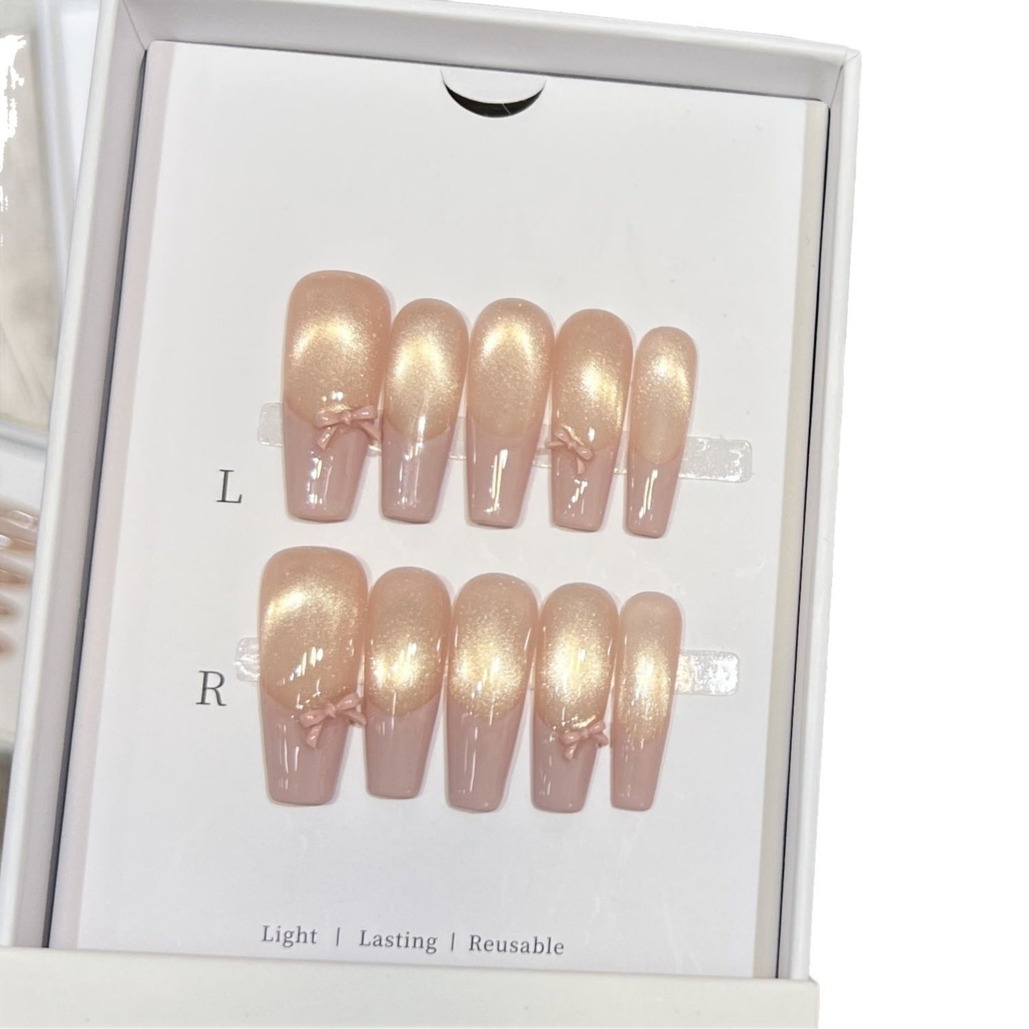 Wiederverwendbares Press-On-Nagelset mit eleganten Schleifenakzenten Brehn
