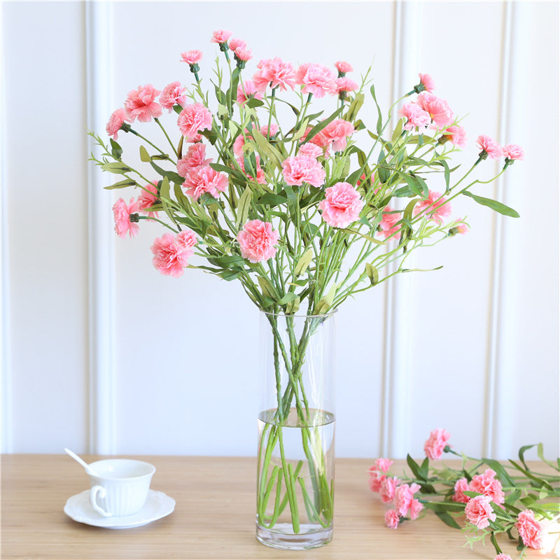 Realistische Seidenblumenstielarrangement