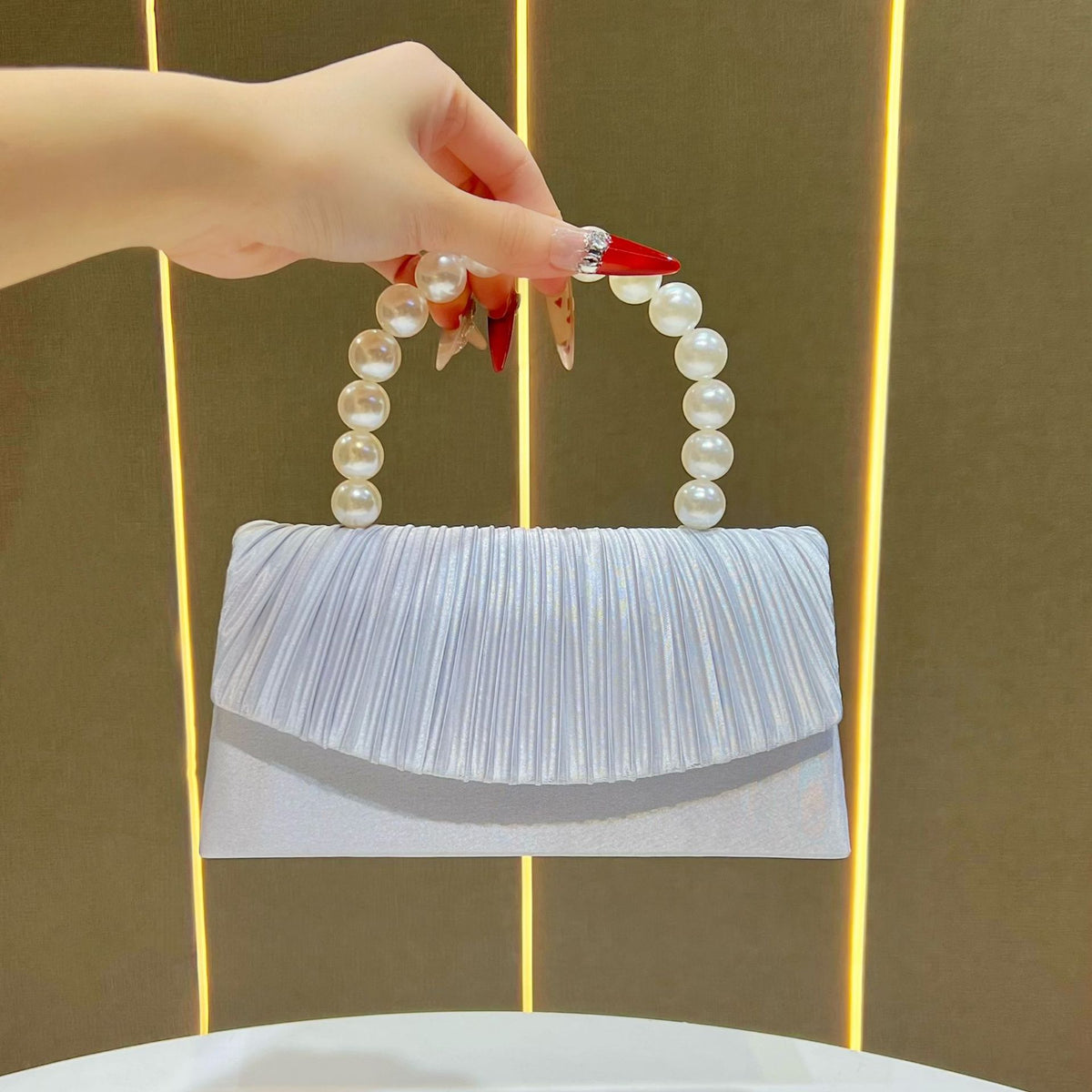 Elegante gefaltete Abendhandtasche