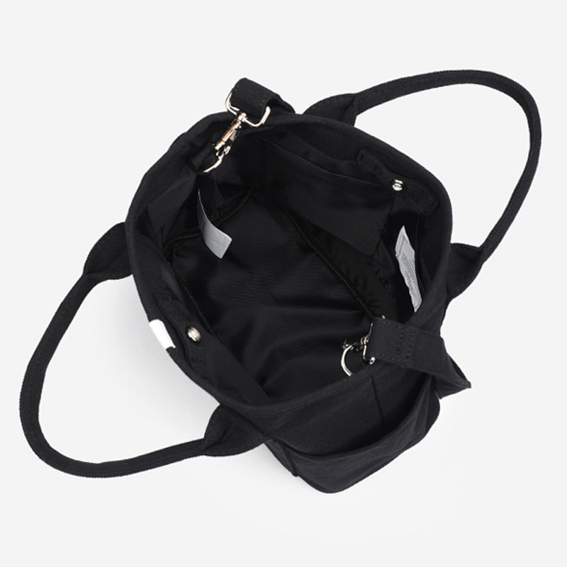 Damen Handtasche mit mehreren Fächern und verstellbarem Schultergurt Brehn