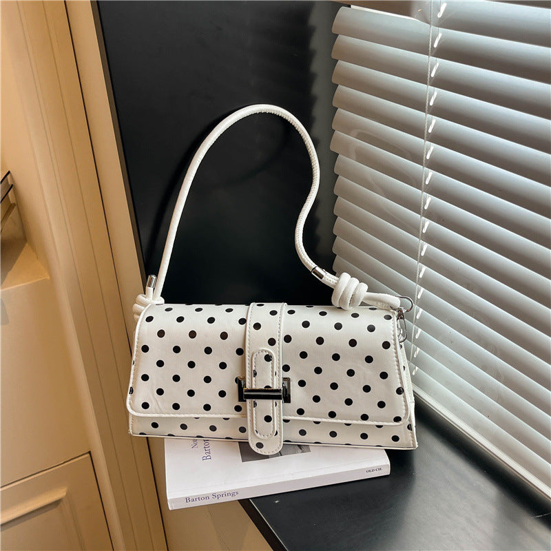 Punktemuster Clutch Handtasche