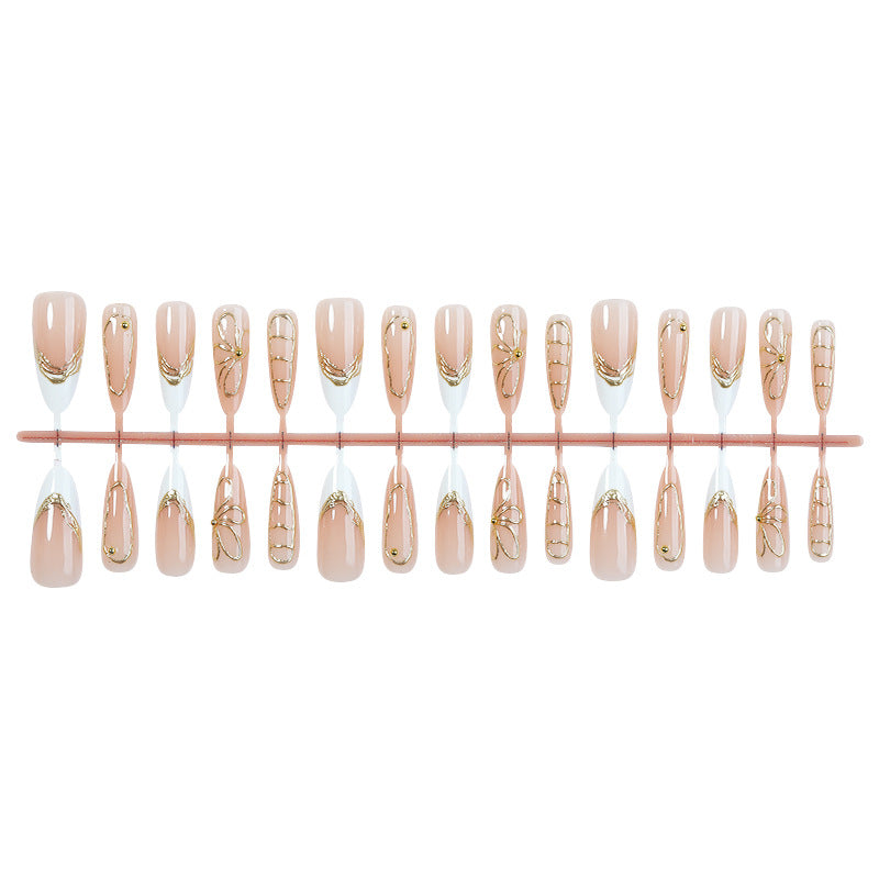 Kunstnagelset mit elegantem floralem Goldakzent Brehn