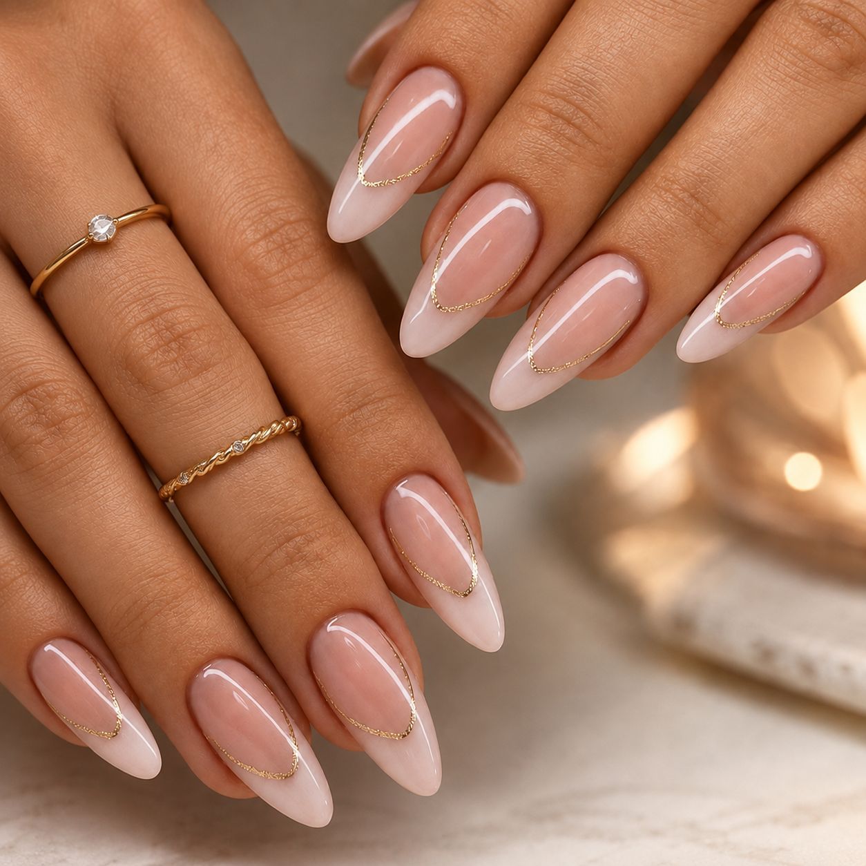 Elegante Kunstnägel mit Goldakzenten Brehn