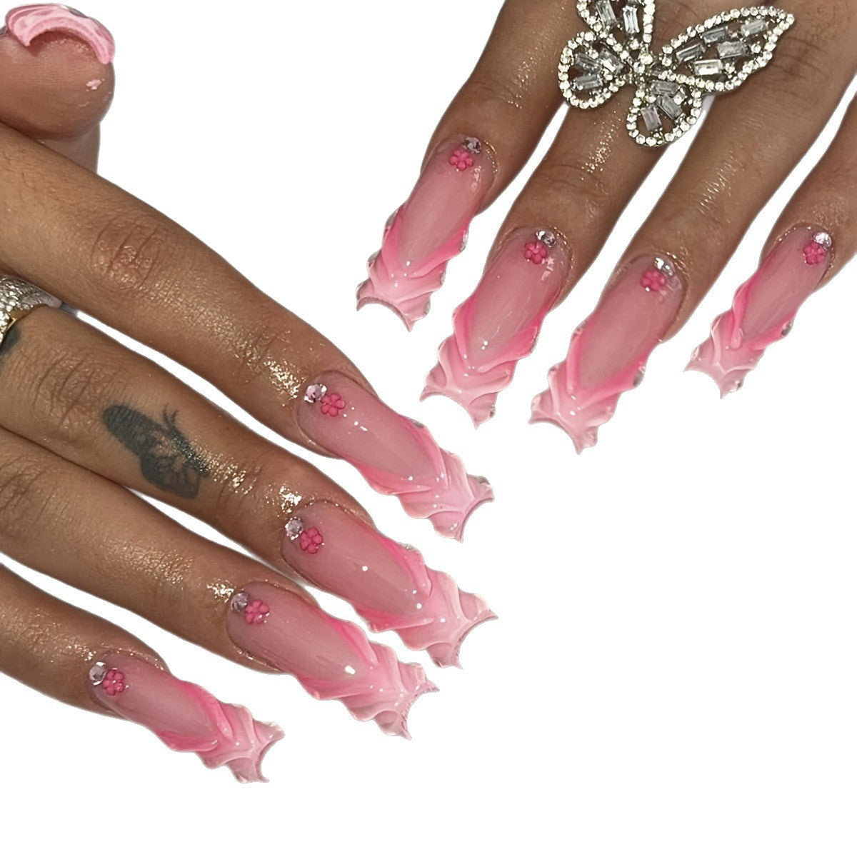 Kunstnagelset mit floralem 3D-Design und glitzernden Akzenten Brehn
