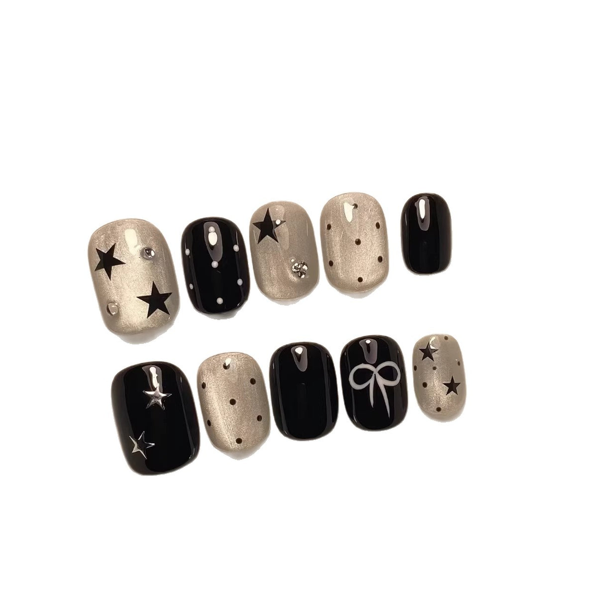 Dekoratives Press-On Nagelkunst-Set mit Stern- und Schleifendesigns