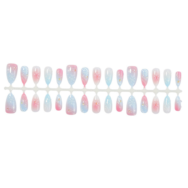 Kunstnagelset mit elegantem Ombre-Design und Blütenverzierungen Brehn