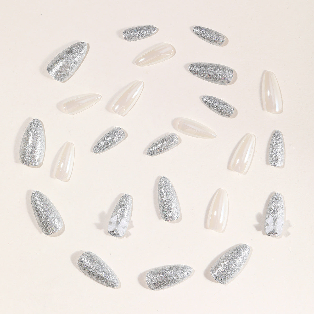 Elegante Stiletto-Nagelkunstverlängerungen mit 3D-Schleifenakzenten Brehn