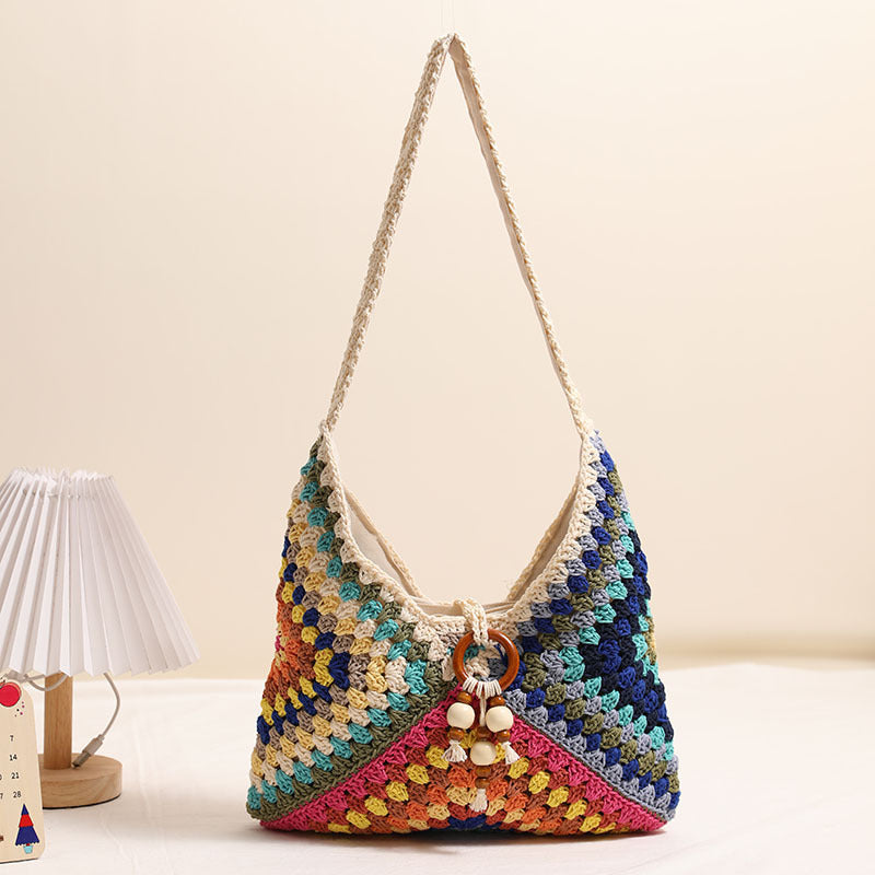 Damen Handtasche mit kunstvollem Flechtmuster Brehn