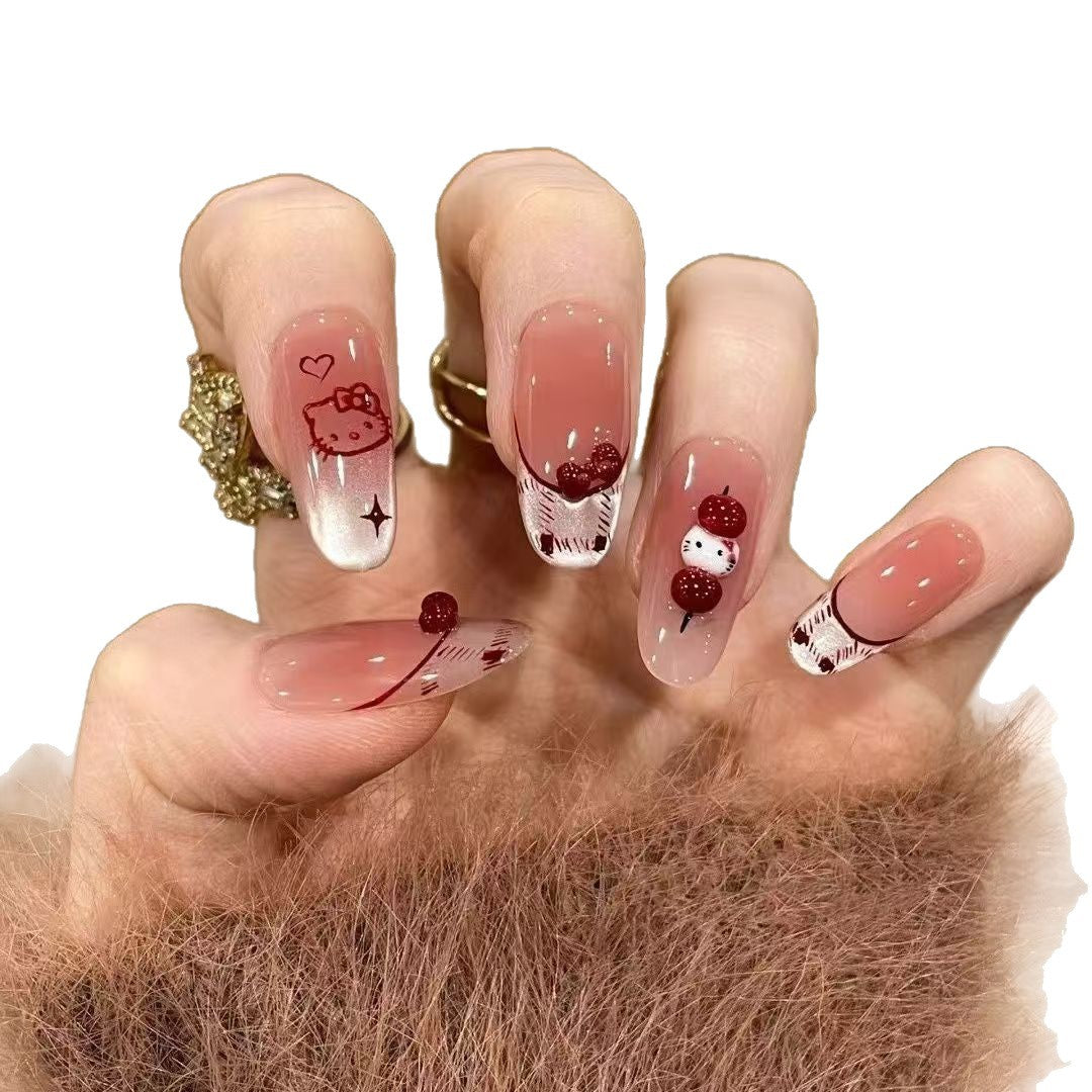 Niedliche themenbezogene Press-On Nagelkunst