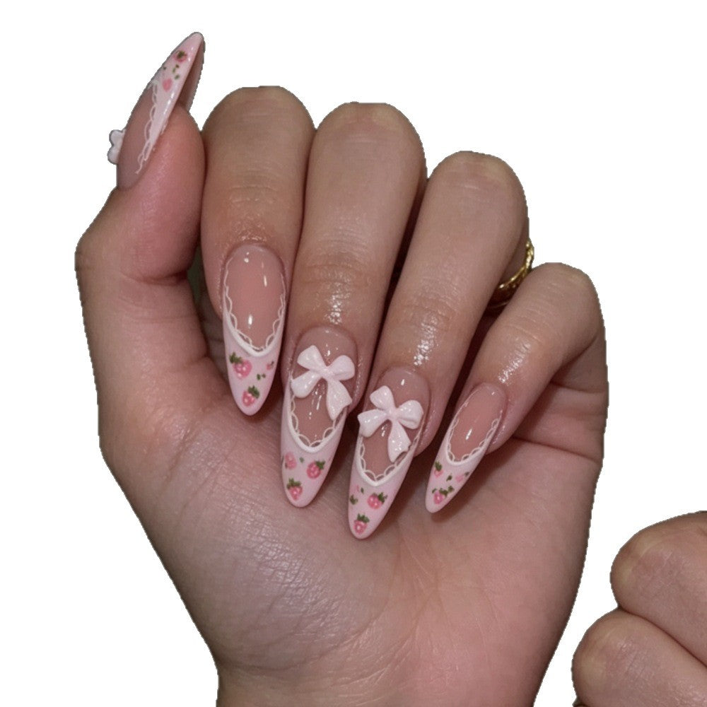 Elegante Stiletto Press-On Nägel mit floralem und Schleifenakzenten Brehn
