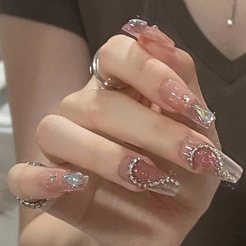 Dekorativer Press-On-Nagelset mit eleganten Edelstein-Accents Brehn