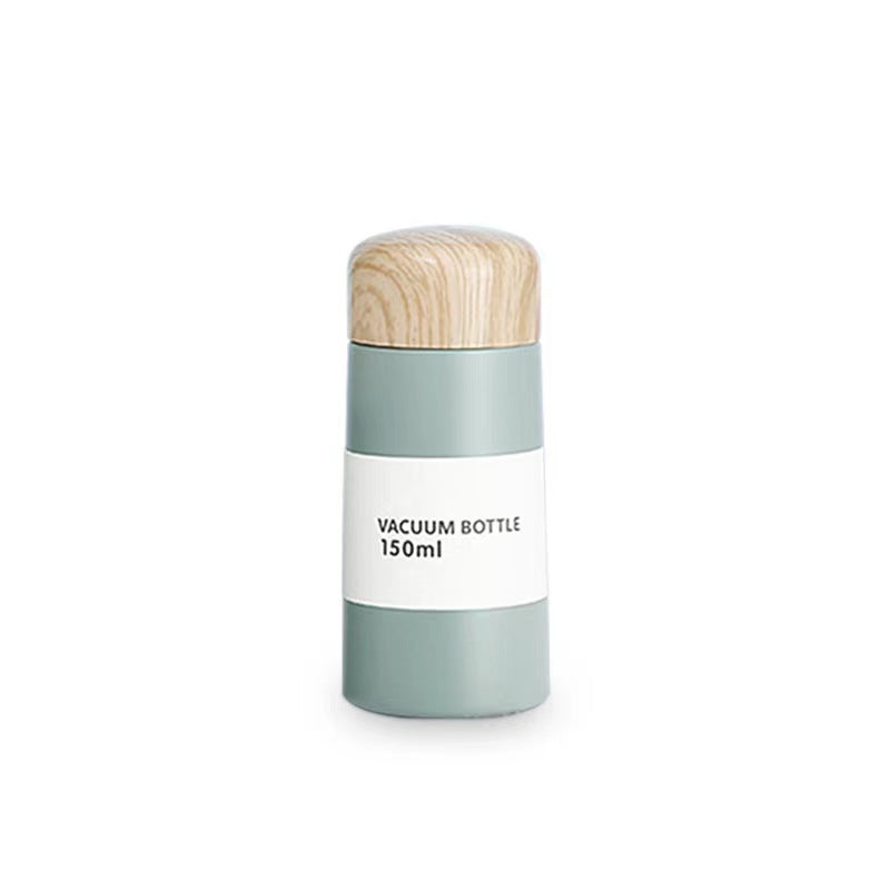 Damen vakuumisolierte Wasserflasche mit innovativem Holzdeckel Brehn