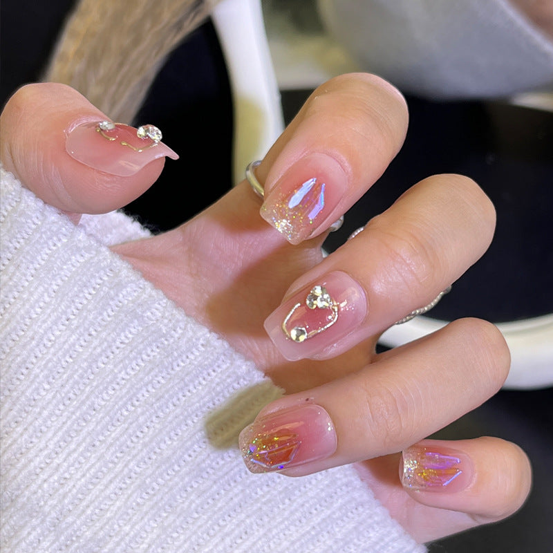 Dekorative Acryl-Press-On-Nägel mit Strassakzenten Brehn