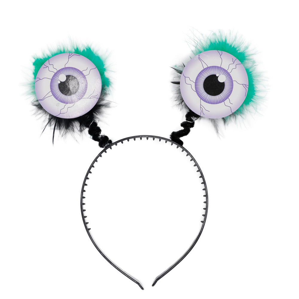 Lustiger Haarreif mit Augenmotiven
